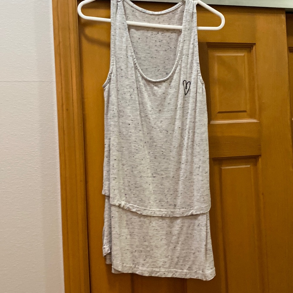 Latched Mama boyfriend nursing swing tank
